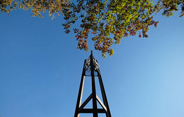 Low angle view of the watch tower sculpture on UNLV campus.