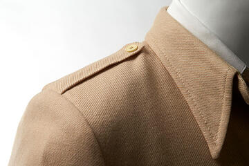 The epaulet was born of function and used by military men to hold gloves, compasses, handkerchiefs, and tools. As sportswear redefined menswear in the early 20th century, the epaulet became fashionable with a push from designers such as Coco Chanel, who found inspiration in the uniforms of her military beaux.