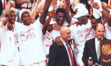 1990 NCAA Championship celebration with players Stacey Augmon, Larry Johnson, Anderson Hunt, Chris Jeter, David Butler, and Moses Scurry.