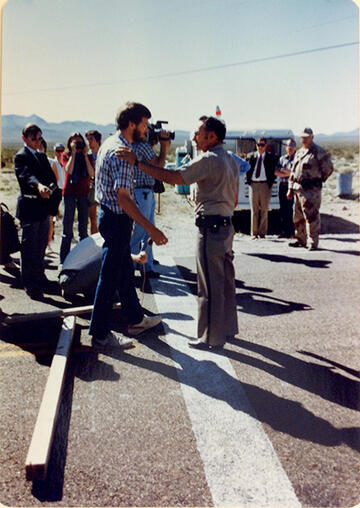 Protesters confront police and military personnel