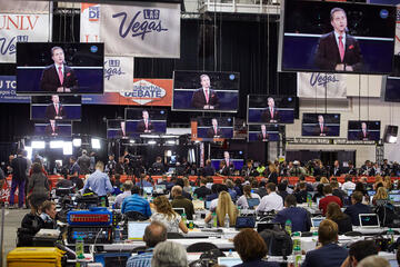 UNLV President Len Jessup on the screen in media filing room, better known as Spin Alley.&nbsp;When Jessup's welcoming speech aired on screens at the Student Union Watch Event, the audience cheered. (Josh Hawkins/UNLV Photo Services)