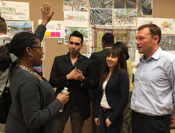 Westside resident Shondra Summers-Armstrong, left, talks with architecture students Mohamed Al Jaonni, Sandra Conteras-Chavez, and urban designer Joaquin Karakas of MODUS. (Courtesy of Kirsten Clarke)