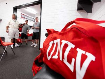 Since Sam Boyd Stadium is an off-campus venue, gear is packed in trunks and shuttled to the stadium the day before a game and returned to campus to be washed and sanitized after each game.