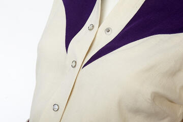 Detailed view of a western styled shirt.