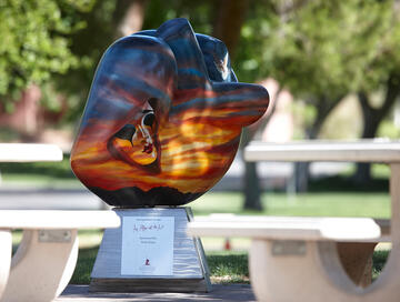 Colorful heart sculpture by Don Michael Jr outside of the Student Union Building.