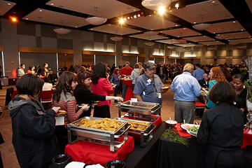 UNLV employees dining at holiday reception.