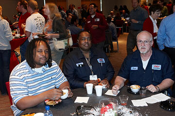 UNLV employees dining at holiday reception.