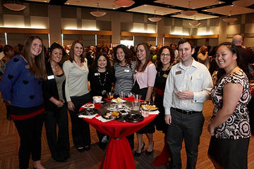 UNLV employees posing at holiday reception.