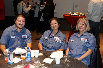UNLV employees posing at holiday reception.