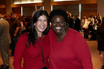 UNLV employees posing at holiday reception.