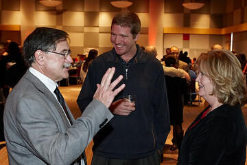UNLV employees posing at holiday reception.