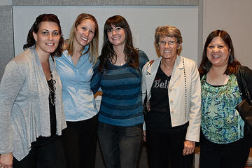 UNLV employees posing at holiday reception.