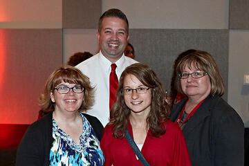 UNLV employees posing at holiday reception.