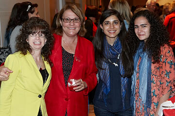 UNLV employees posing at holiday reception.