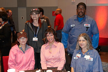 UNLV employees posing at holiday reception.