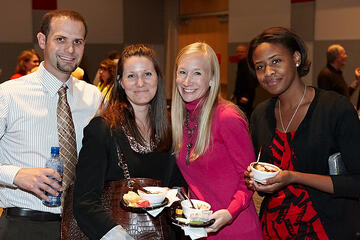 UNLV employees posing at holiday reception.