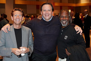 UNLV employees posing at holiday reception.