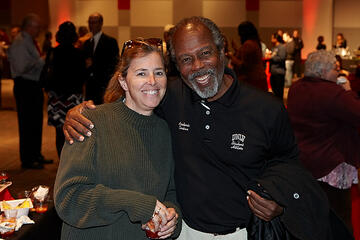 UNLV employees posing at holiday reception.
