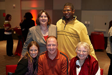 UNLV employees posing at holiday reception.