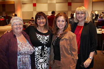 UNLV employees posing at holiday reception.