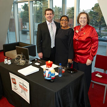 UNLV employees posing at holiday reception.