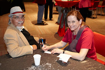 UNLV employees posing at holiday reception.
