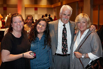 UNLV employees posing at holiday reception.