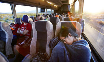 Sunrise breaks as the Honors College students grab a little rest on the way to the California event.