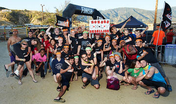 Tough Mudder contestants pose for a group photo.