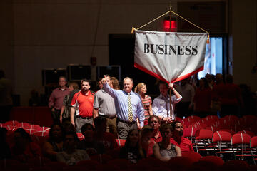 Lee Business School Dean Brent Hathaway calls out to his students as he leads his faculty and staff into The Cox Pavilion during the start of UNLV Creates, Aug. 21, 2015. (Aaron Mayes/UNLV Photo Services)
