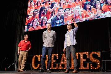 From left, UNLV President Len Jessup watches, as&nbsp;Life Is Beautiful's&nbsp;Justin Weniger and&nbsp;Rehan Choudhry announce a gift of one ticket to this year's festival&nbsp;for everyone who registered and attended&nbsp;UNLV Creates event. (Aaron Mayes/UNLV Photo Services)&nbsp;