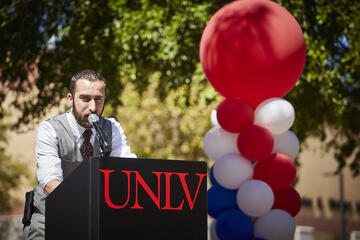 A speech given outside during a rally event.