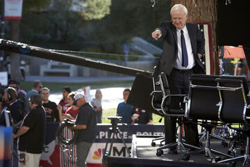 Chris Matthews points to the crowd around the MSNBC stage. Right before "Hardball" started broadcasting on Tuesday, Matthews was chair-dancing to his own theme song. During the commercial breaks, he played with the crowd, noting "This is a good school. Back in my day we looked for two things: ratio and weather."