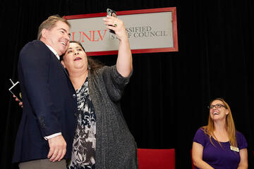 Two people taking a selfie