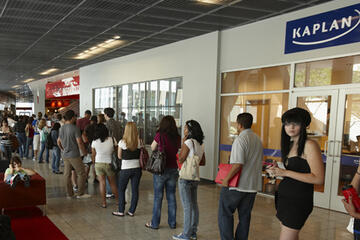 Students standing in line inside of the Student Union.