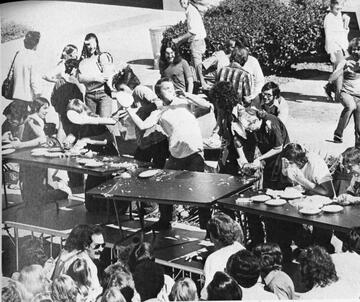 This CSUN-sponsored pie-eating contest turned into a crazy pie fight at a campus homecoming event near the Student Union in 1975. (UNLV Special Collections)