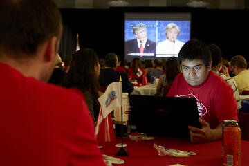 Multitasking at the Student Union's watch event for the Oct. 19 Presidential Debate. (R. Marsh Starks/UNLV Photo Services)