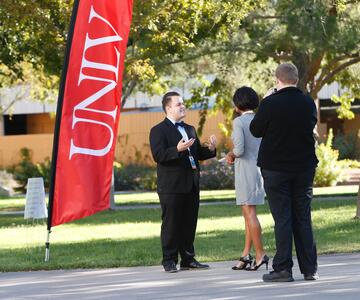 Student body president Carlos Fernandez conducts an interview with WJXT-TV Jacksonville reporter&nbsp;Joy Purdy.