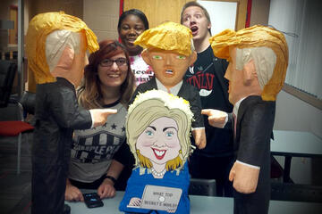 Tonopah Hall residents kicked off the debate watch event with piñatas of the candidates.