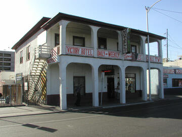 Front diagonal view of the Victory Hotel.