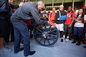 Head football coach Tony Sanchez was the first to splash&nbsp;some fresh paint on the cannon.