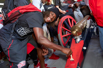Each member of the football team added to the cannon's Rebel transformation. After the ceremony, the trophy was delivered to the UNLV paint shop, where workers will fully refinish the cannon in scarlet paint.