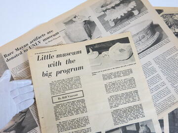 old newspaper clippings about the museum