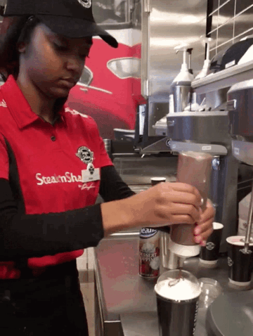 employee prepares milkshake