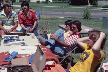 Several students at a tailgate in the 1970s
