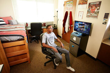 Tre Williams in dorm room