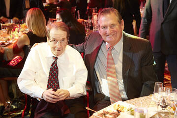Two men having dinner