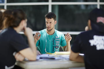 person leading a study group