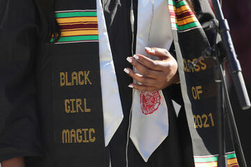 shot of a grad shawl saying Black Girl Magic