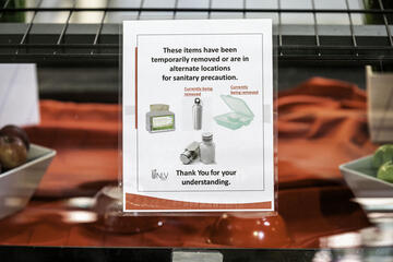 COVID sign explaining removal of items